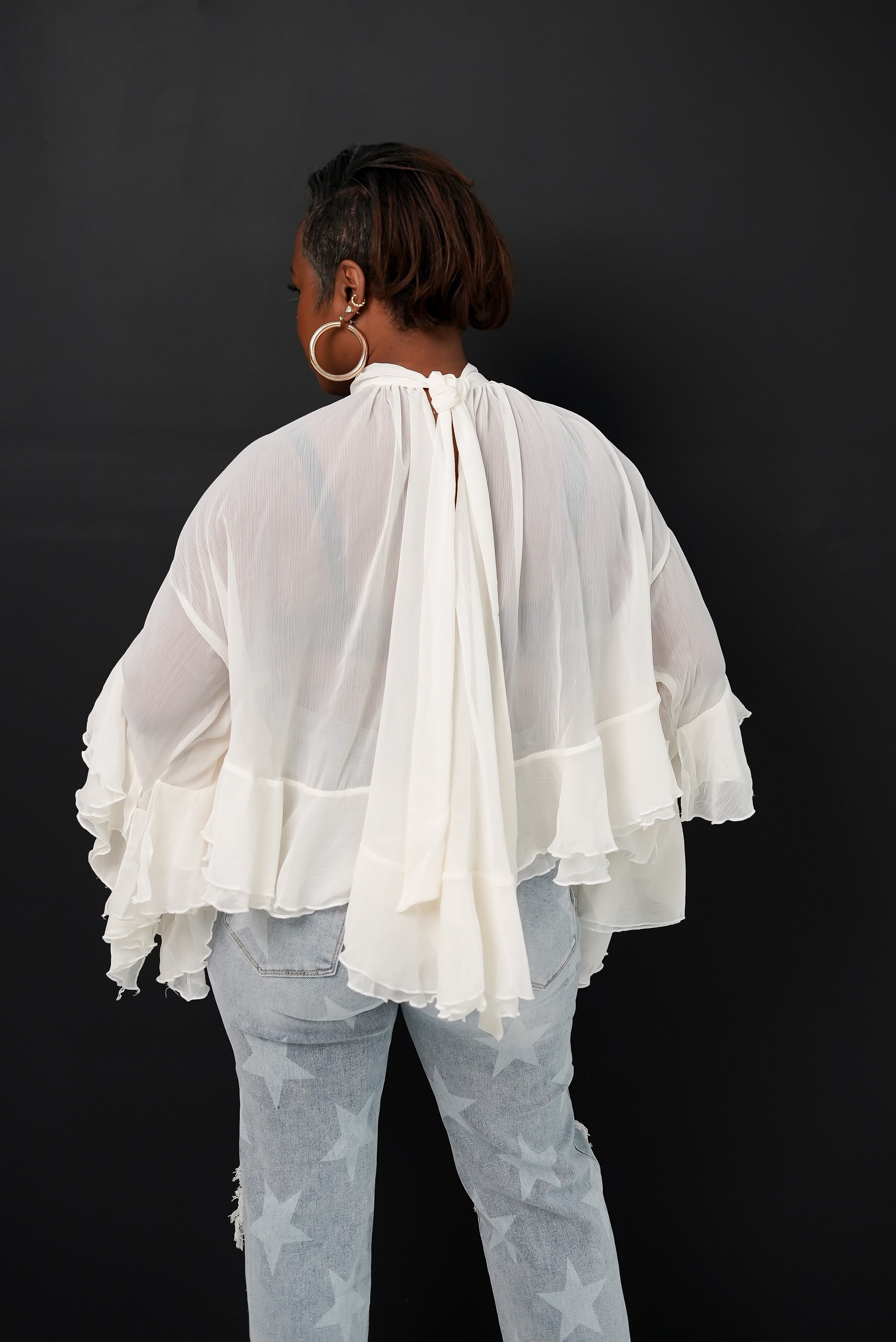 Angel Energy Ruffle Statement Blouse